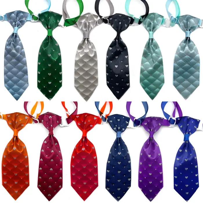 50/100pcs Animal Chiot Liens Chien Accessoires Pour Animaux De Compagnie Chien Noeud papillon Fleur 