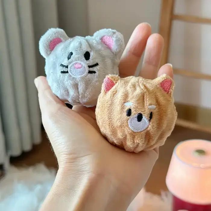 Jouet à bille pour chiot qui couine