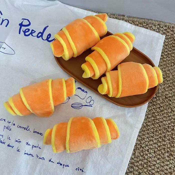 Jouet pour chien en forme de croissant souple