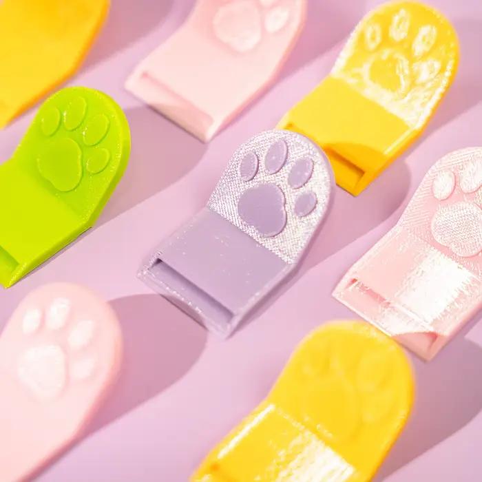 Ouvre-boîte pour nourriture pour animaux de compagnie en forme de patte de chat imprimé en 3D