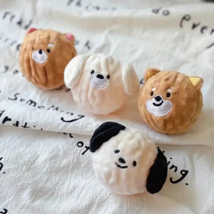 Jouet à bille pour chiot qui couine