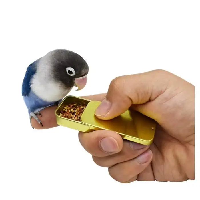 Pot de nourriture d'entraînement pour oiseaux