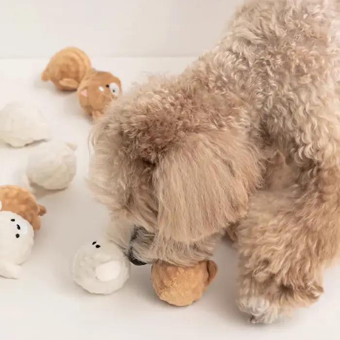 Jouet à bille pour chiot qui couine