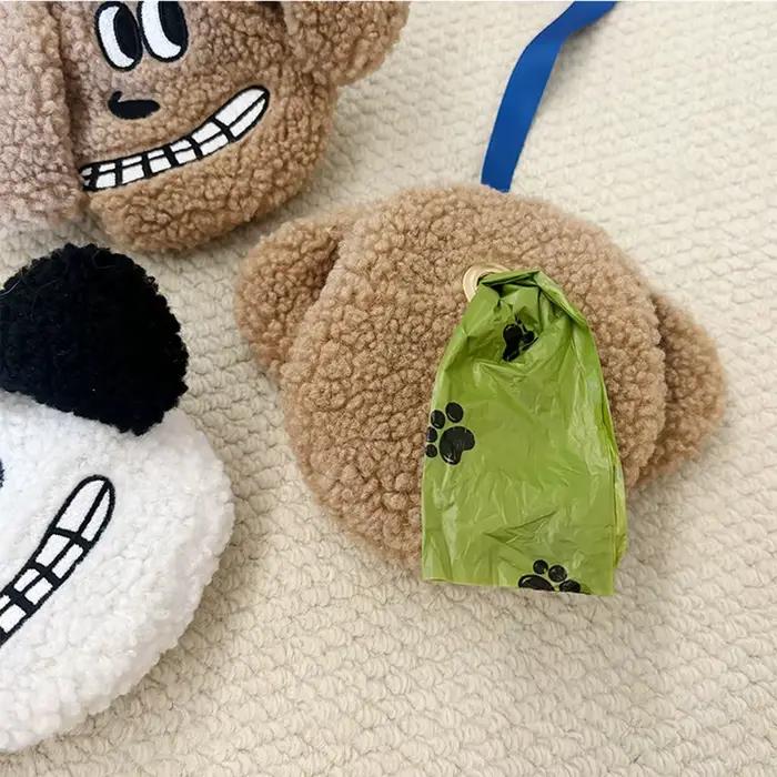 Distributeur de sacs poubelles en peluche pour chiot